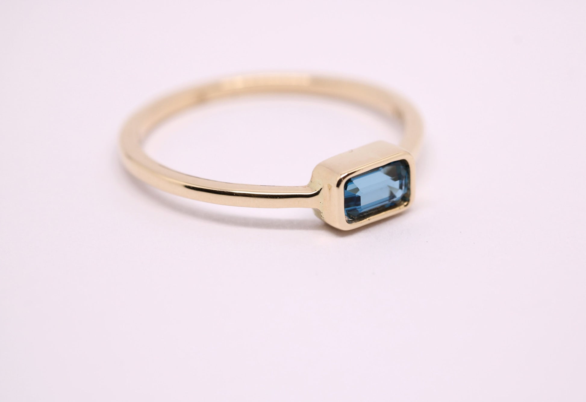 14k Gold London Blue Topaz Ring: Emerald Cut December Birthstone