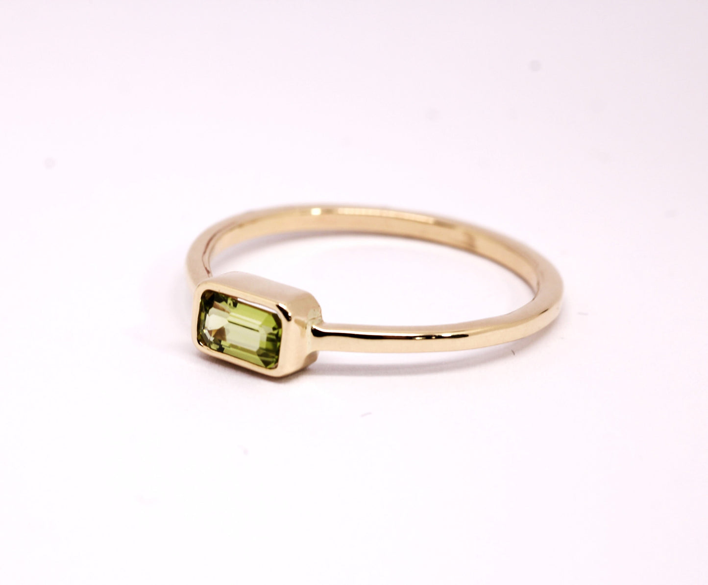 14k Gold Peridot Ring: Emerald Cut August Birthstone