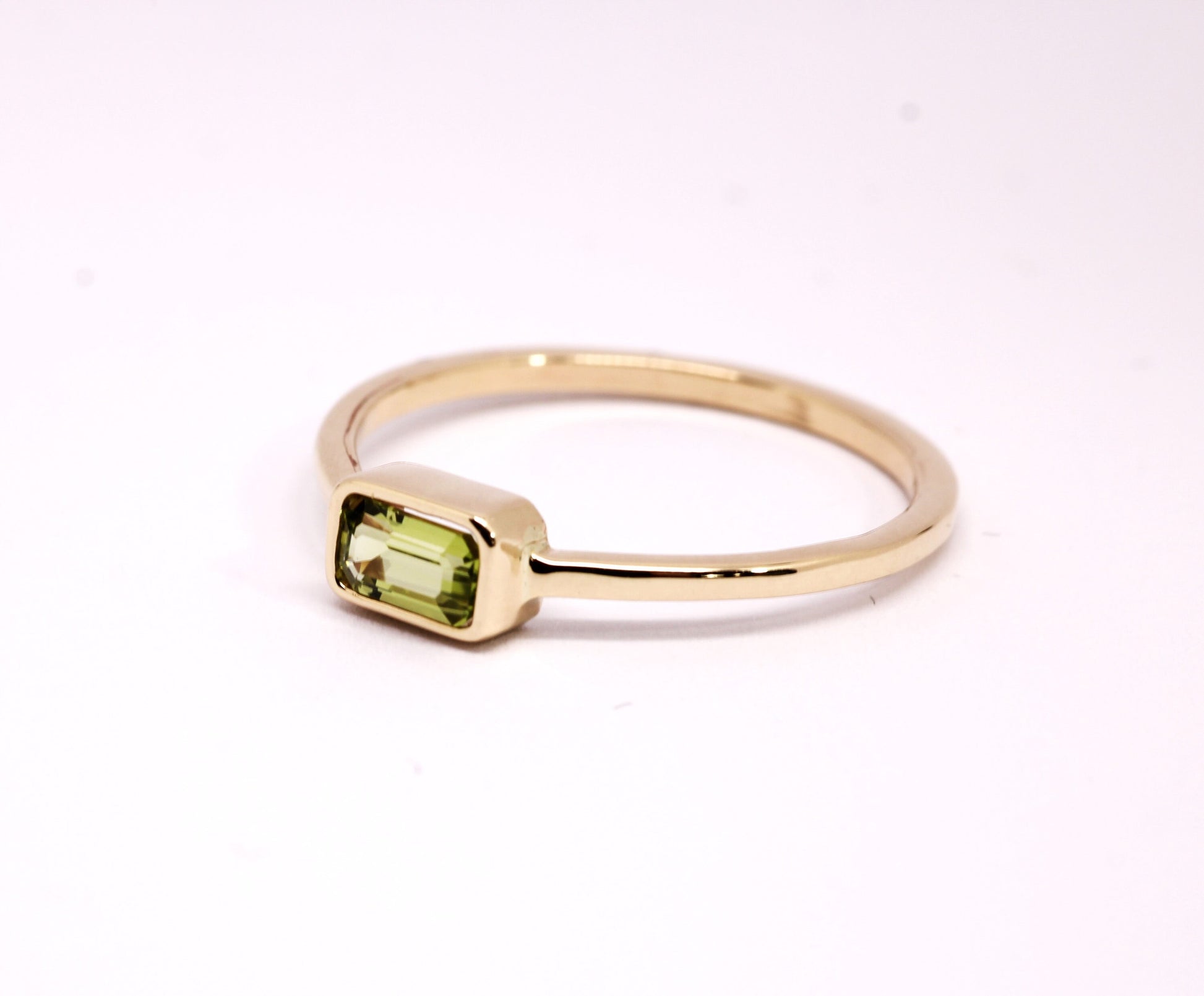 14k Gold Peridot Ring: Emerald Cut August Birthstone