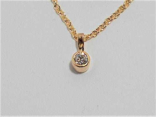 14k Yellow Gold Diamond Solitaire Necklace: .15ct SI Diamond