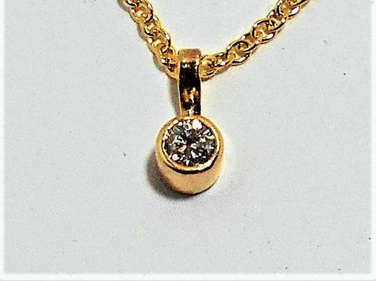 14k Yellow Gold Diamond Solitaire Necklace: .15ct SI Diamond